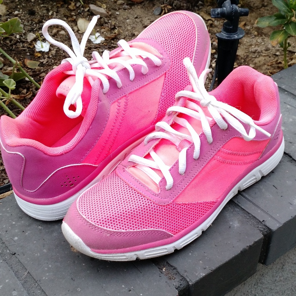 Size 7 sneakers.  Pink and purple.  Wore once.